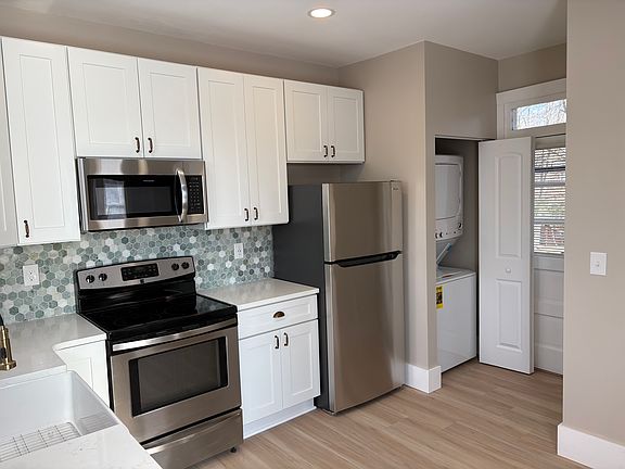 Brand new washer/dryer combo included!