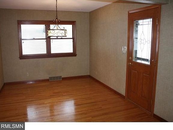 Formal Dining Room. Hardwood floors. New light fixture.