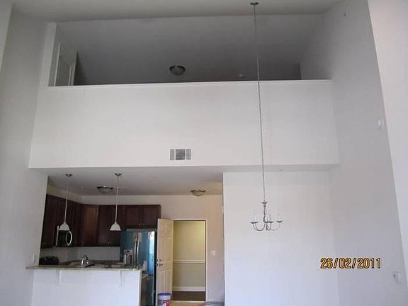 view to the kitchen and loft