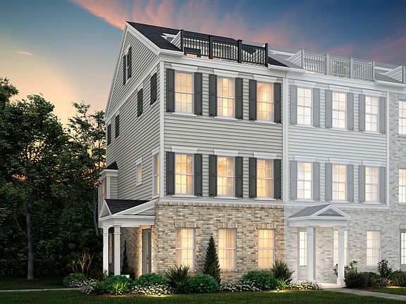 Broxton Exterior 74 features James Hardie TM siding, brick, covered front door, terrace and 2 car r