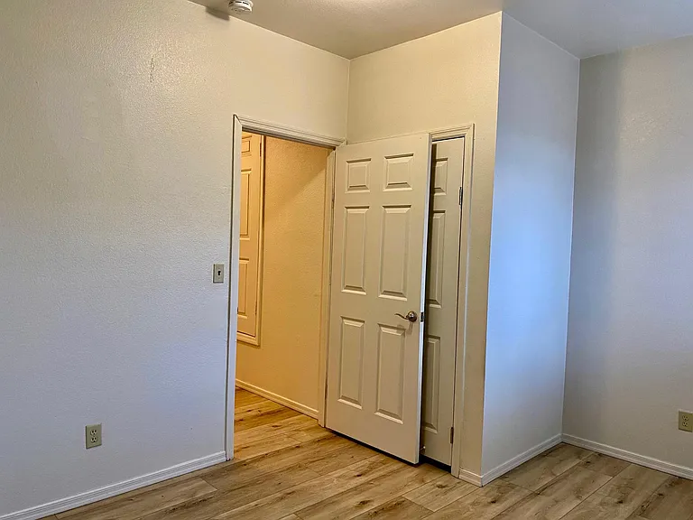 bedroom 3, high ceiling, large closet behind door