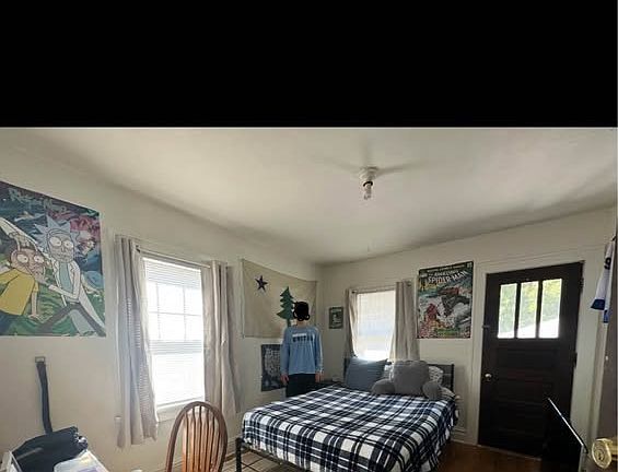 Door in the background leads to private balcony