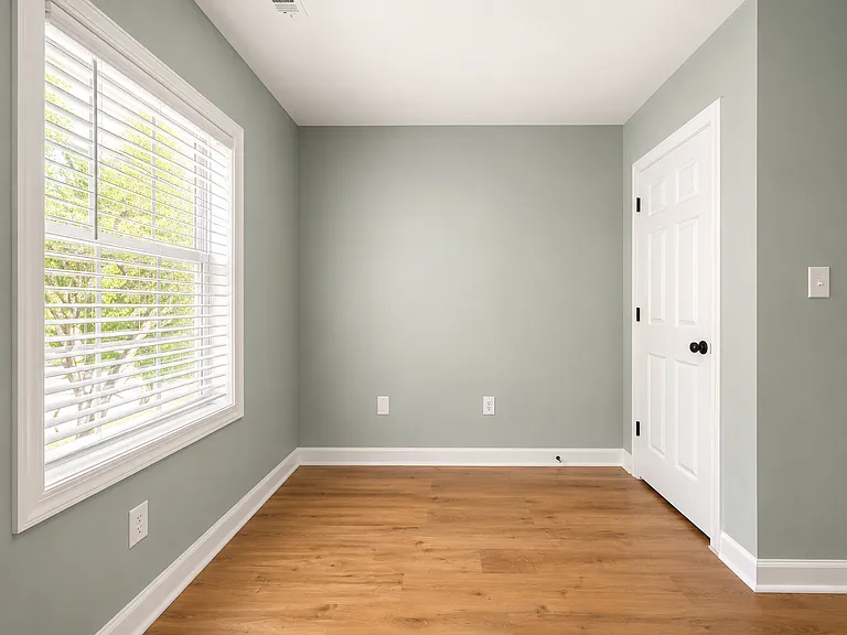 Secondary bedroom on top floor with closet.