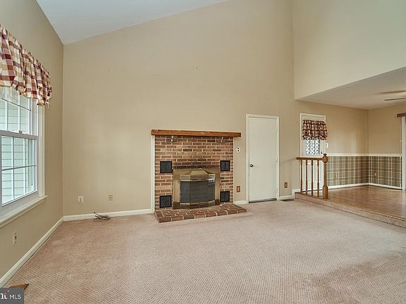 Family Room with Wood Burning Fireplace