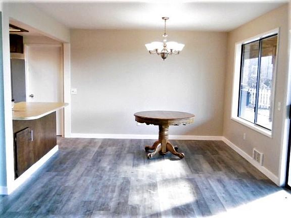 Dining Area...New Light Fixtures Thru-out Home