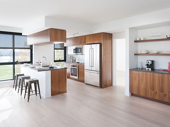 Open kitchens with sleek layouts and stainless steel appliances