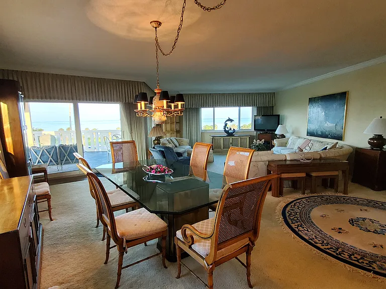 Extra large living and dining space with adjoining balcony