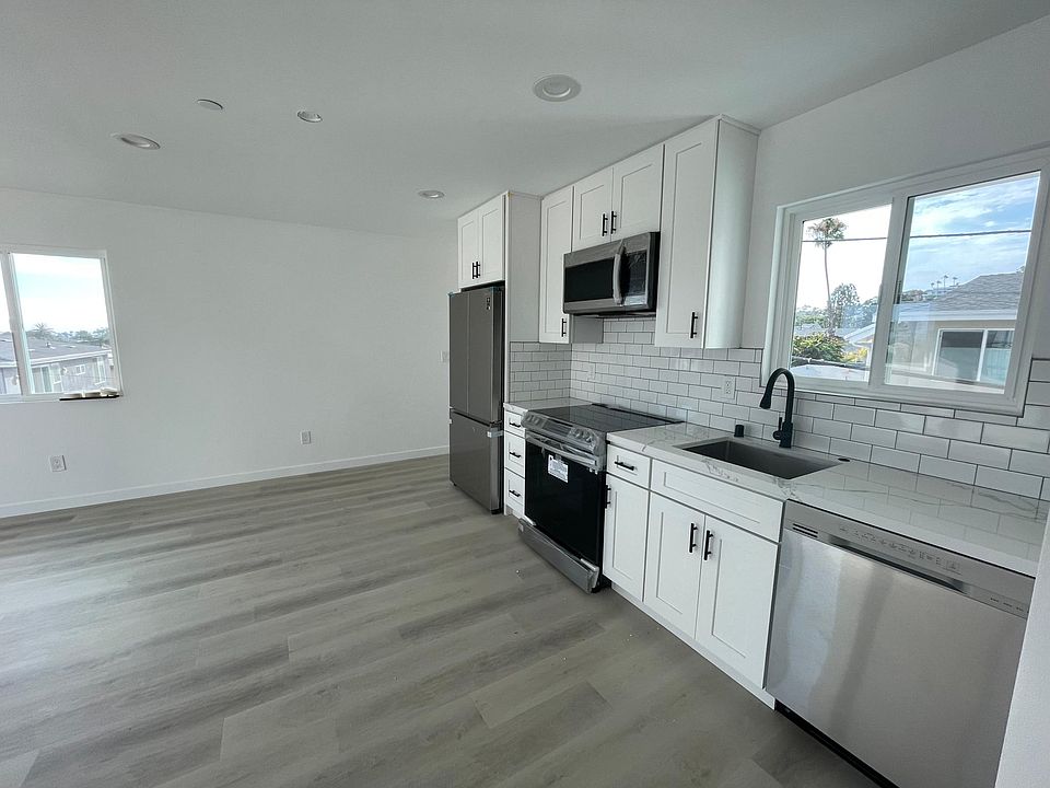 Kitchen - brand new with quartz countertops and Samsung Stainless Steel Appliances