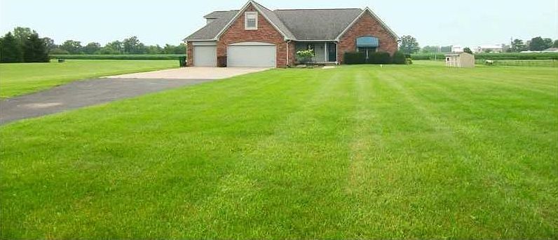 Exterior Front. Beautiful front yard.