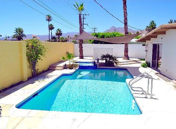 Pool with waterfall spa