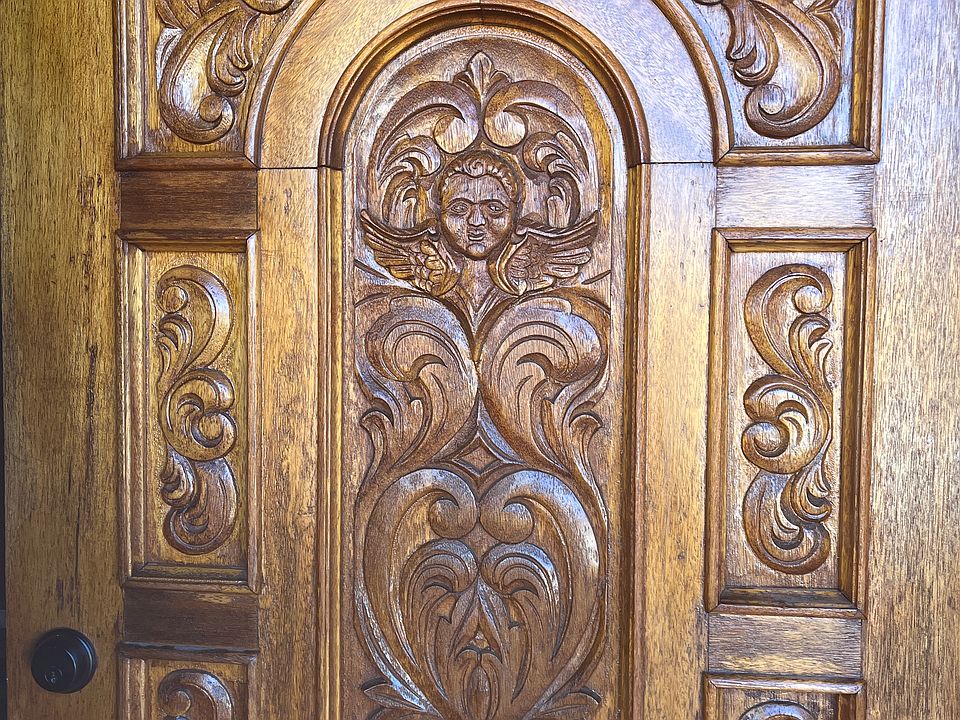 Beautiful carved door fully restored.