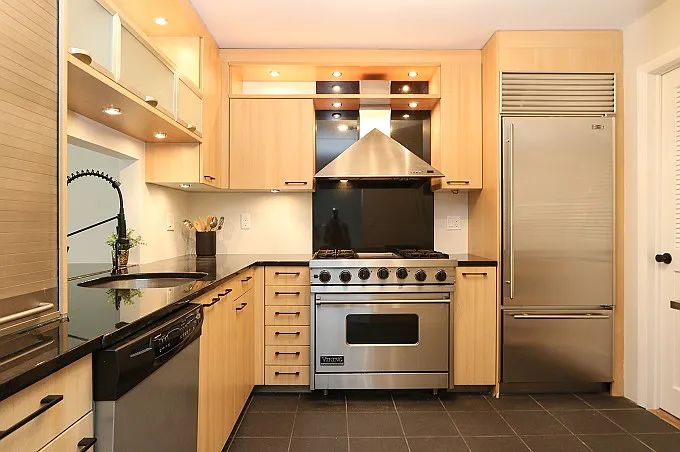 Kitchen with Viking gas stove, Sub-Zero refrigerator, Wirlpool dishwasher and Samsung microwave.