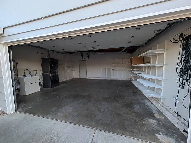 2 car garage with shelving