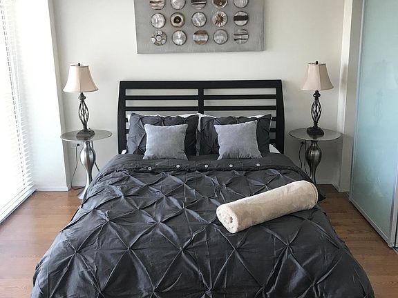 Queen Size Bed, Closet (Right), Balcony (Left)