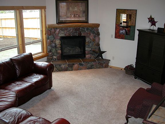 Montana River Rock Fireplace and picture windows!