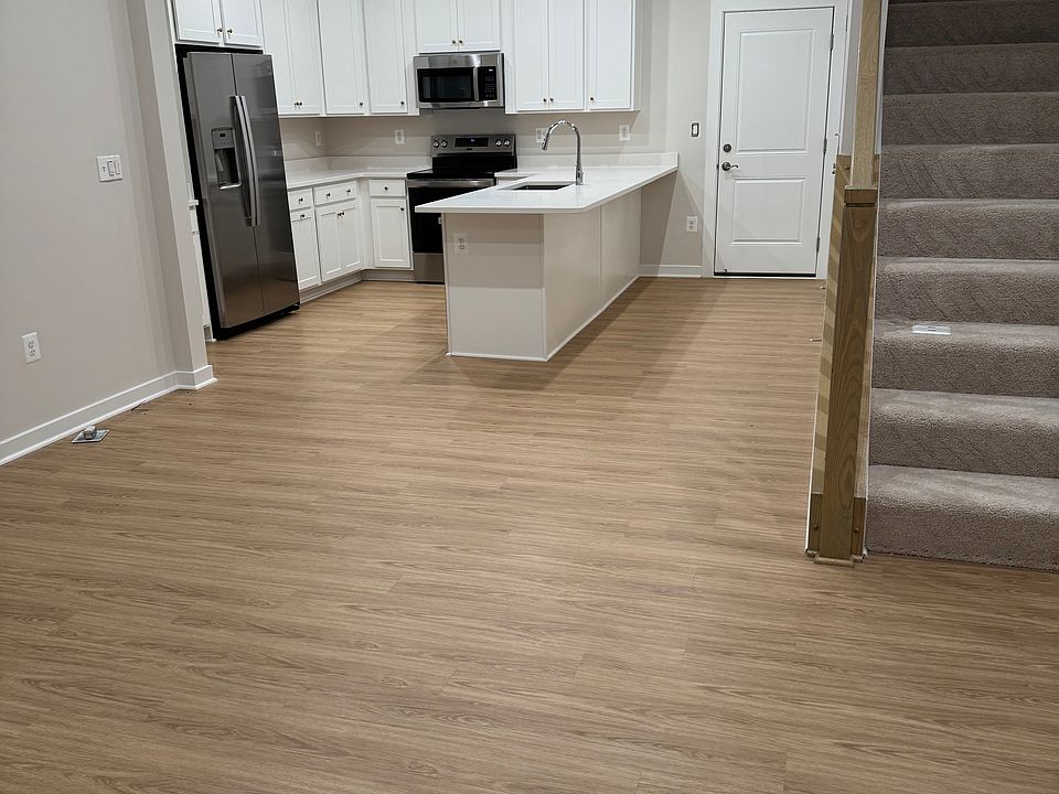 Whole shot of spacious kitchen.