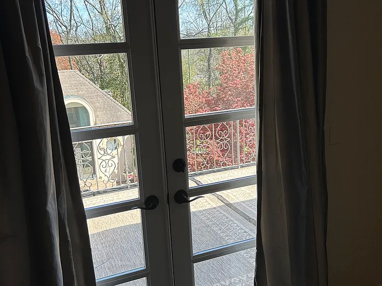 Upstair veranda with French door to media/recreation room