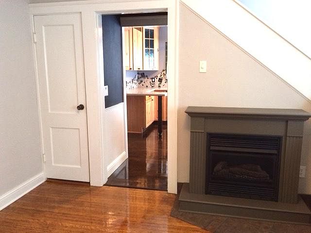 DR into kitchen. Original oak floors!