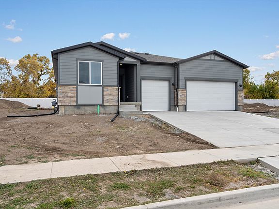 The Weber floorplan exterior image taken at a Meritage Homes Community in Grantsville, UT.