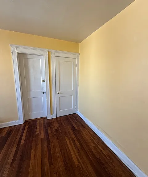 Living Room. From lobby see living room. Left is EMERG Exit-Door, Right is closet door.