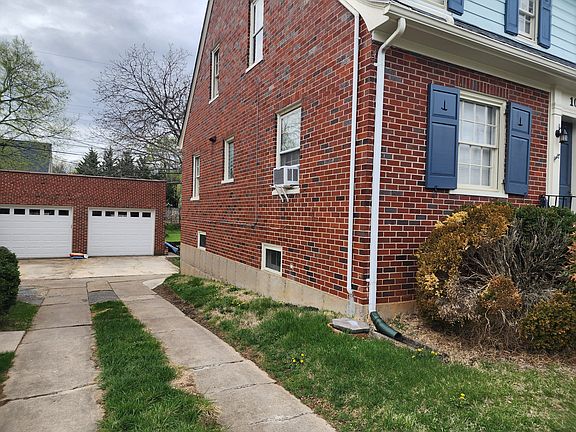 Entrance to the apartment is in the back of the house.