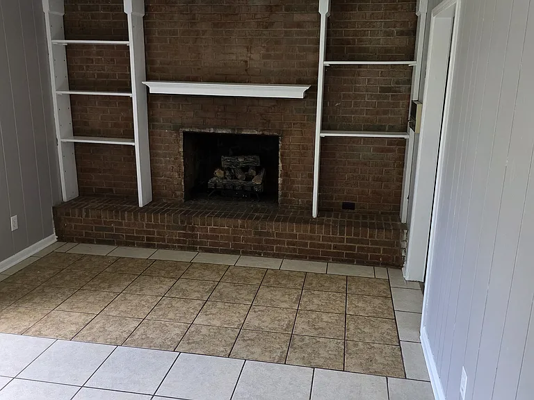 Fireplace in den.