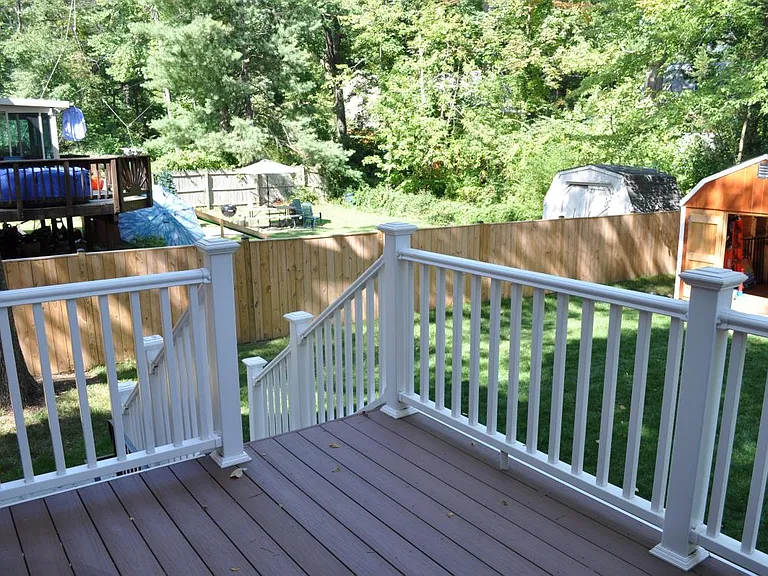 deck off kitchen for easy access to backyard and grill