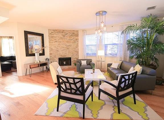 Spacious family room with upgraded flooring, fireplace, and more!