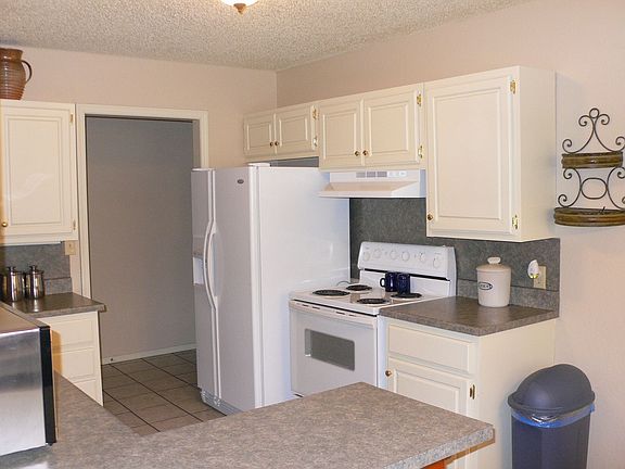 Open kitchen with newer stove