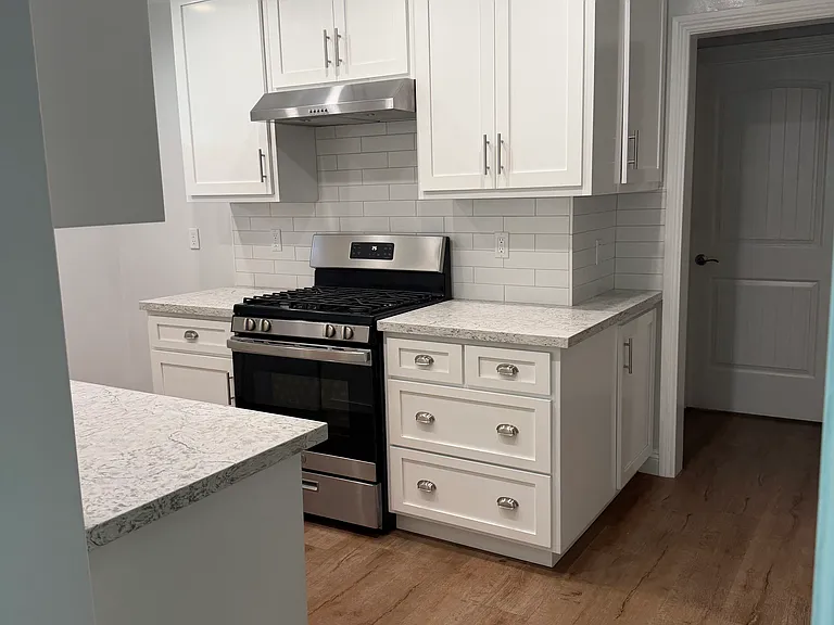 Kitchen with stove.