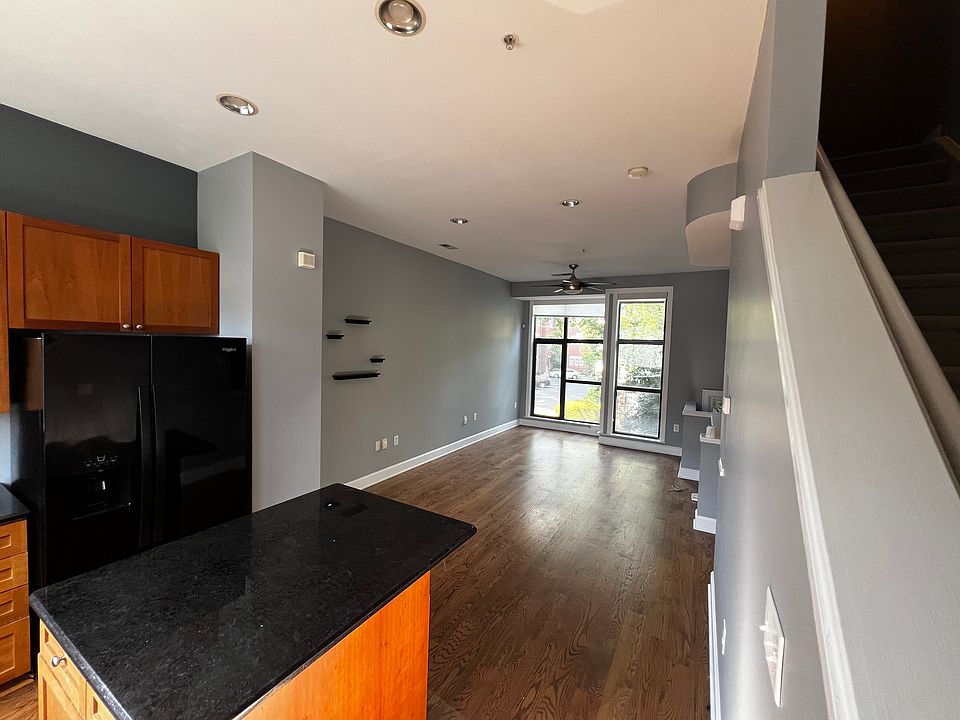 Kitchen and living room view from stairs