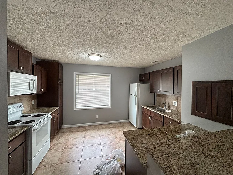 8865-8871 Holmes Ave — Photo 3