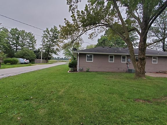 Quiet neighborhood, edge of town.