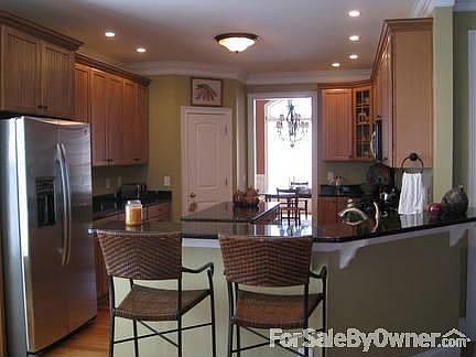 Kitchen
						:
						Granite Countertops and Stainless Steel Appliances