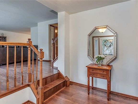 THE ENTRY IS LARGE AND OFFERS EASY ACCESS TO THE REST OF THE HOME.