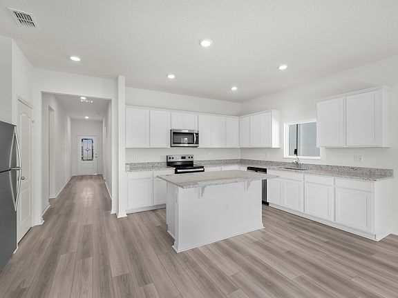 A chef-ready kitchen with granite countertops