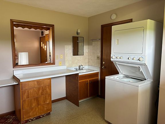 Laundry area/garage entry.