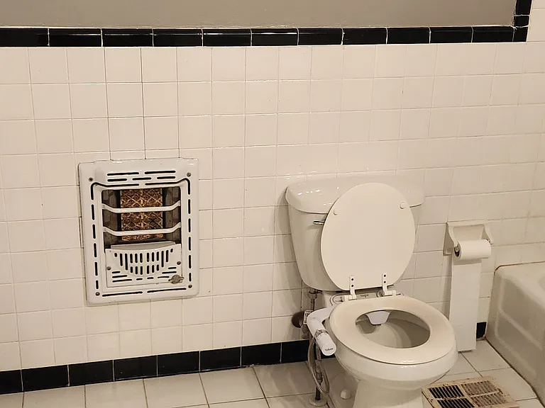 Bathroom is quite big. Two ways to enter...via door to Bedroom 2 or via another door from the hallway (guests don't need to go through the bedroom).