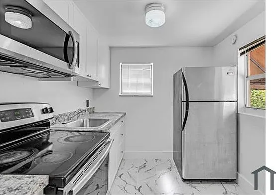56 NW 62nd St — Photo 9