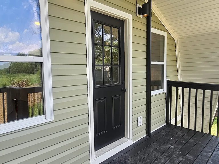 Upstairs back deck off bedroom