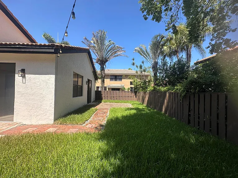 10461 NW 12th Ct — Photo 30