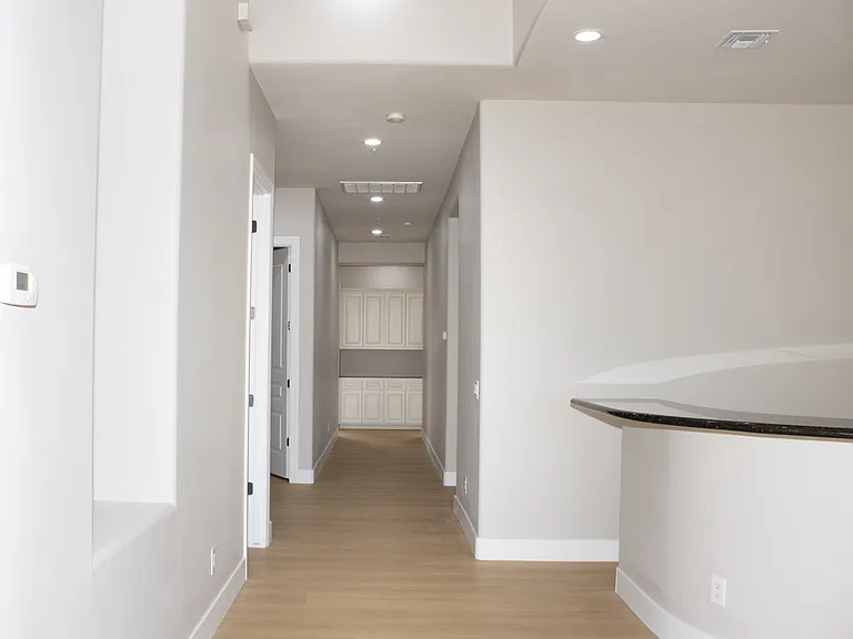 Guest Wing Hallway _ Access to Guest Bedrooms, Laundry & Powder Room