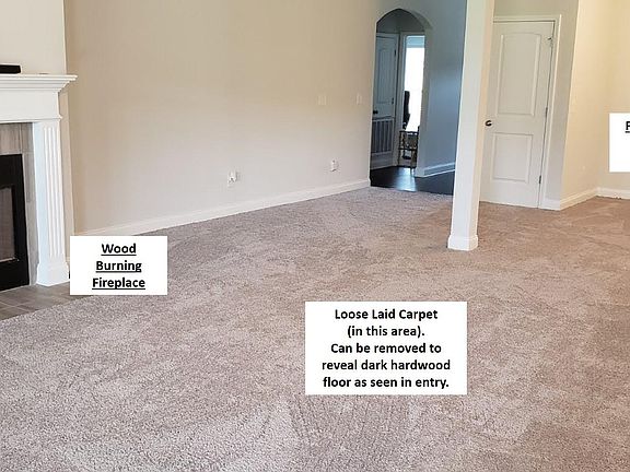 Great room looking towards front of house (kitchen off to right)