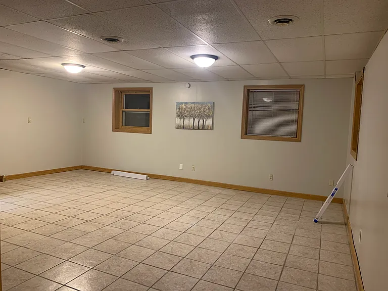 HUGE master bedroom downstairs or a rec room if you don't need 4th bedroom - blinds will be hung