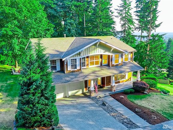 Birds eye view of home showing more of the top of the mountain setting with stunning territorial views.  As you walk the street and neighborhood, you will find gorgeous unobstructed views of Mt Rainier through Licorice Fern.