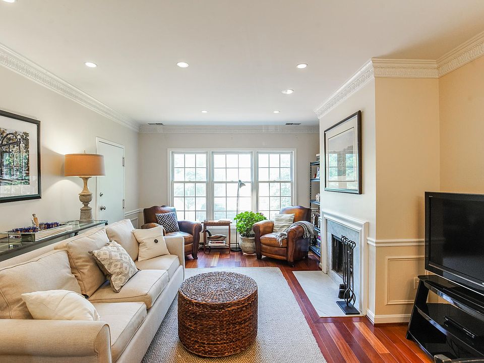 Living room facing 19th Street; front door on left