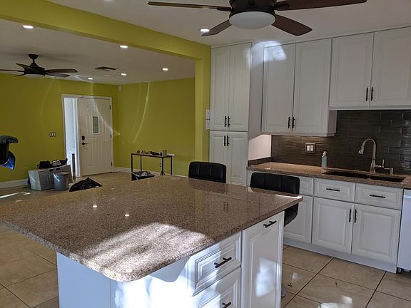 Kitchen opening into family room.