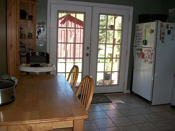 Eat in Kitchen, French doors to deck and backyard bbqing!