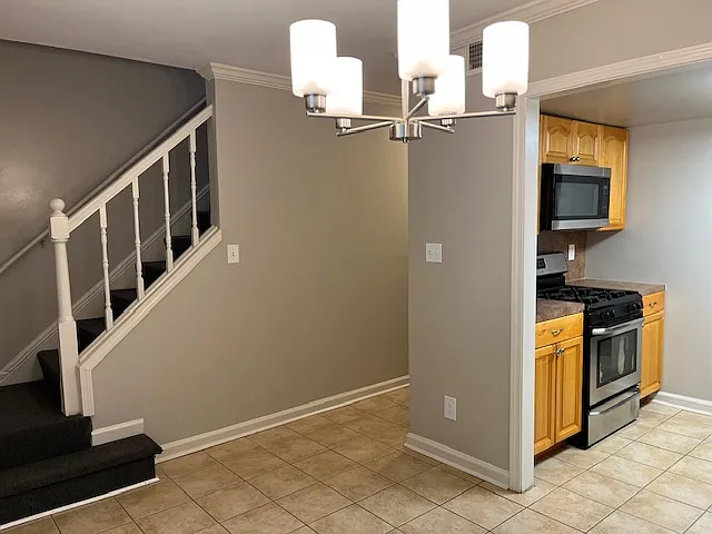 Dining room to kitchen and stairs