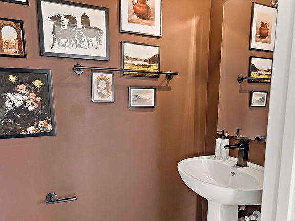 Lower-Level bathroom in a York II South Brook Townhome by DRB Homes, showcasing modern fixtures and
